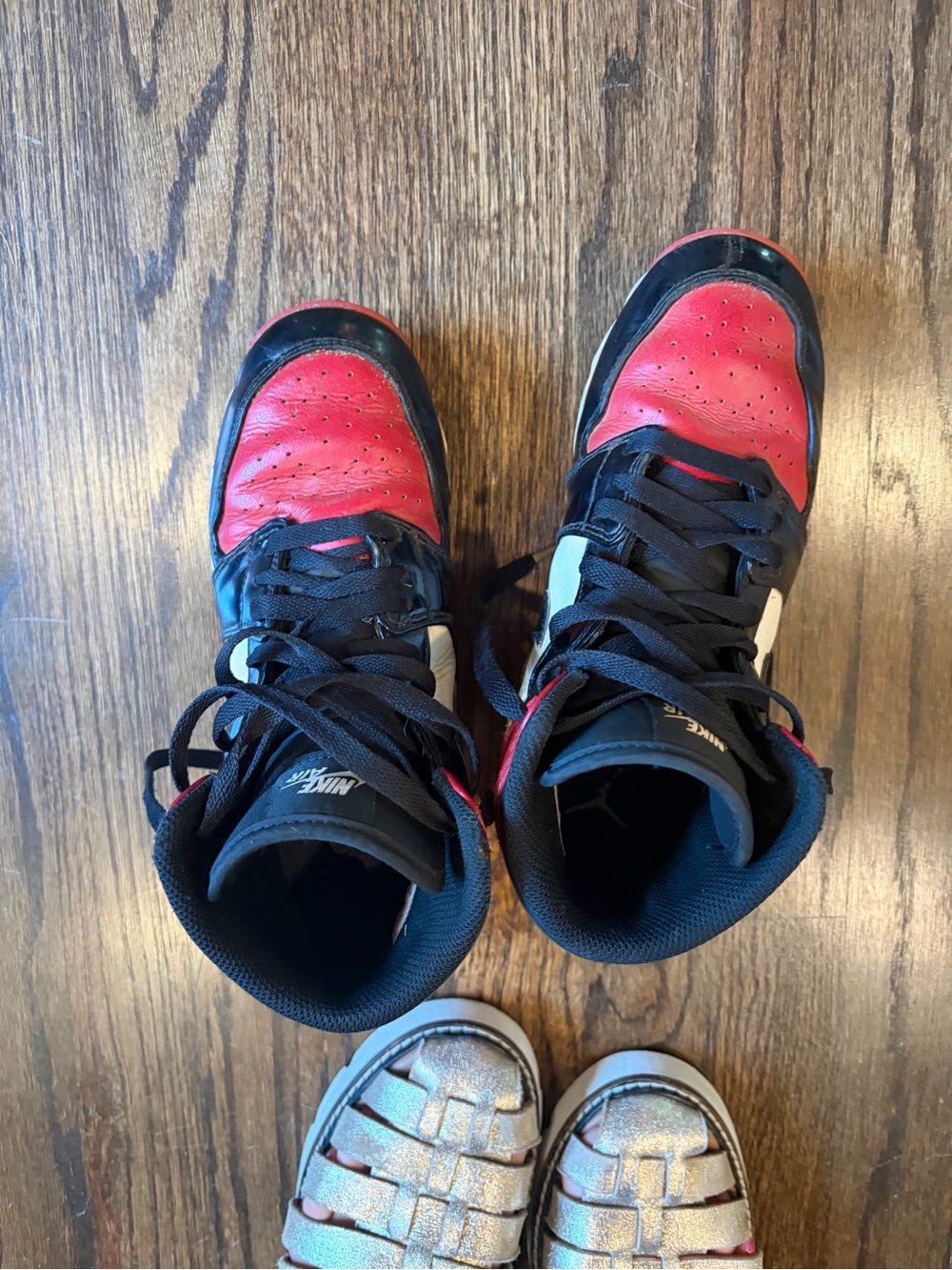 Nike Kids High-Top baseball cleats in Red and Black